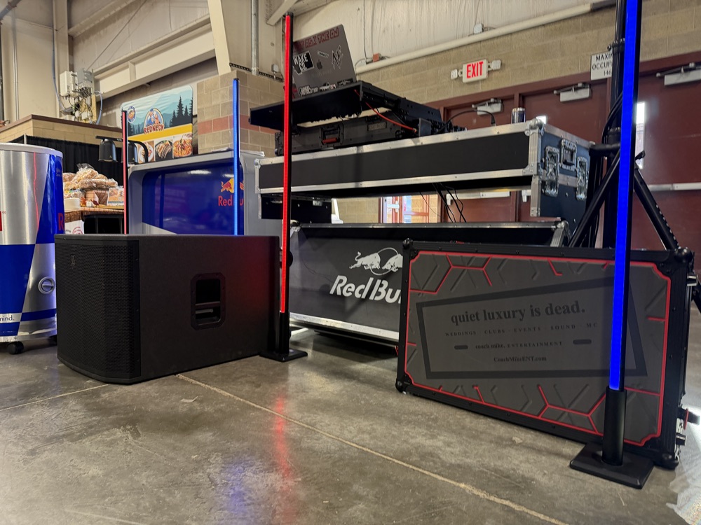 Road case reading quiet luxury is dead in front of the booth